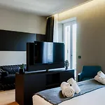 Ama 18 Suites By 