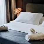 Ama 18 Suites By 