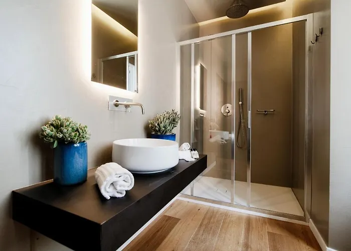 Ama 18 Suites By 
