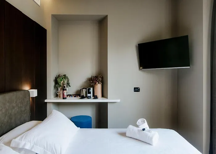 Ama 18 Suites By 