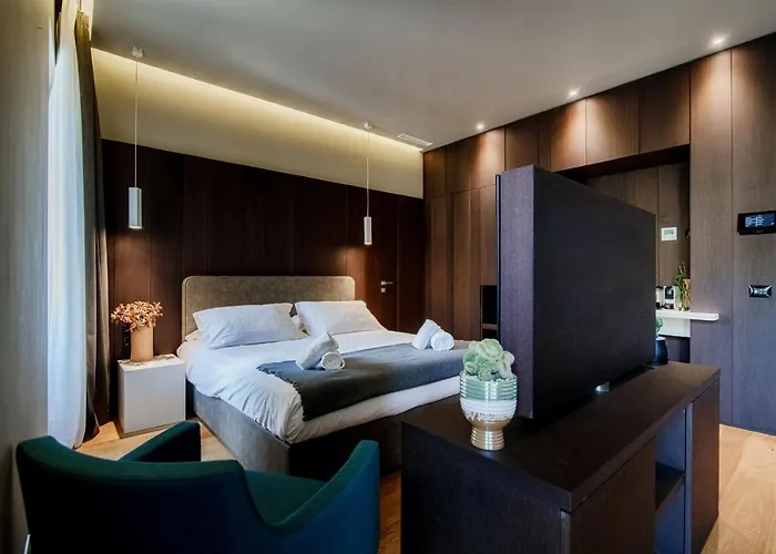 Ama 18 Suites By 