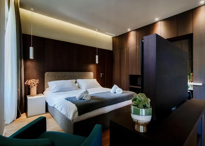 Ama 18 Suites By 