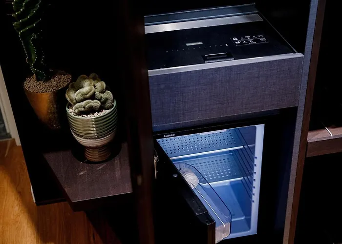 Ama 18 Suites By 
