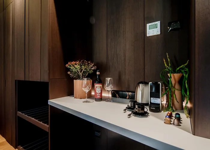 Ama 18 Suites By 