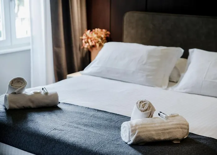 Ama 18 Suites By 