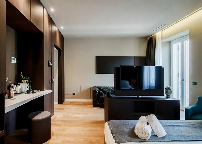 Ama 18 Suites By 