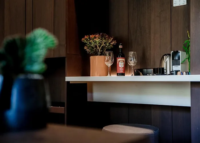 Ama 18 Suites By 