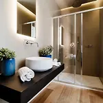 Ama 18 Suites By 