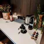 Ama 18 Suites By 