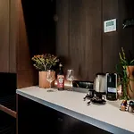 Ama 18 Suites By 